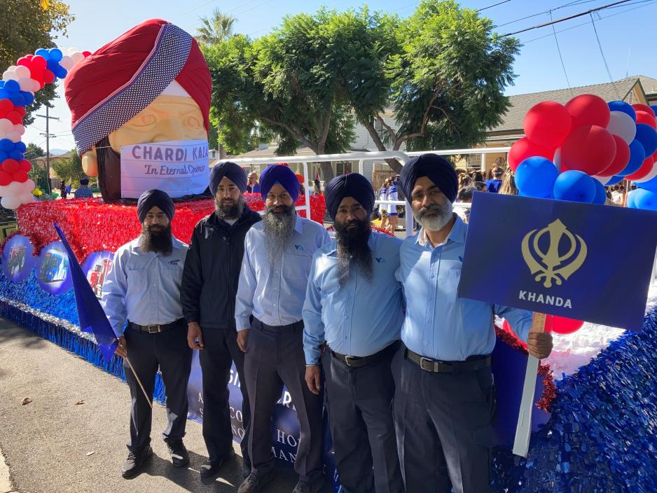 VTA Operators post in front of Sikh Float