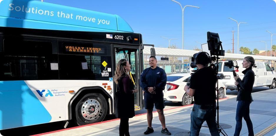 Media Coverage in front of Bus 2 Cropped