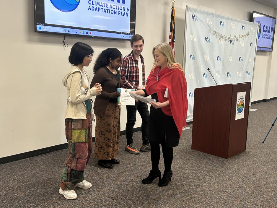 Supervisor Chavez presents certificates to students